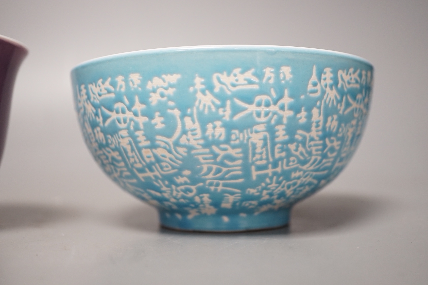 A Chinese copper red glazed bowl and two others